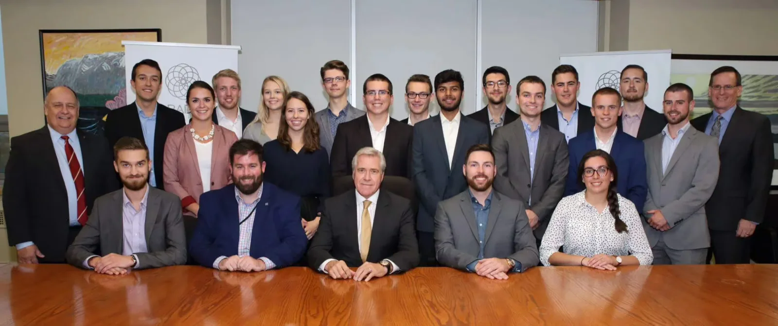 The Paradigm team with Premier Dwight Ball.